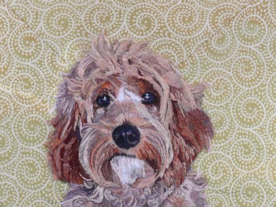 Stacey Chapman: Miss Darcy, 2014, Freehand machine embroidery. Background cloth supplied by client to match decor, partially woven with pure gold thread