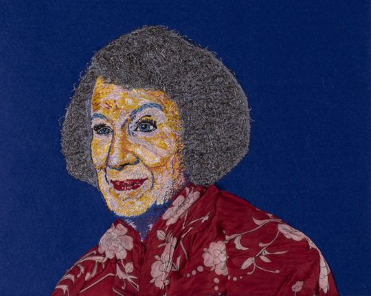 Sorrell Kerrison: Margaret Atwood on Blue, 2017, Hand-stitched DMC thread onto calico, goldwork purl, appliqué on blue felt