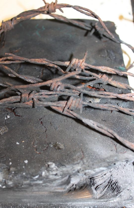 Jean Draper: Burned book and barbed wire