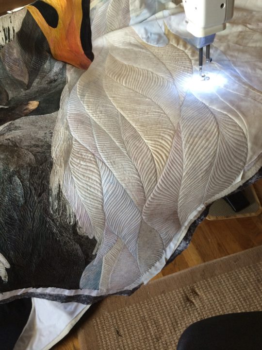 David Taylor: Beneath My Wing, in progress (Detail), 2014, 59w x 42h, cotton fabrics, cotton batting, variegated cotton quilting threads; hand applique, machine quilting