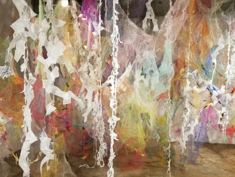 Holly Wong: Mind/Forest (Detail), 2018, 20’L x 15’D x 14’H, Polyester tulle, thread, duralene plastic, polypropylene plastic rope, cotton gauze, origami paper, and monofilament wire