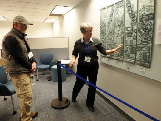 Lindsay Olson: Explaining the artwork and science to a visitor at the University of New Hampshire’s Ocean Discovery Day