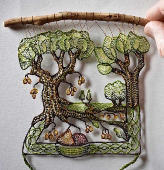 Agnes Herczeg: The garden, 2019, 12 cm high, Needle lace with silk and hemp thread, with copper wire contour, combined with poplar branch. Hand painted