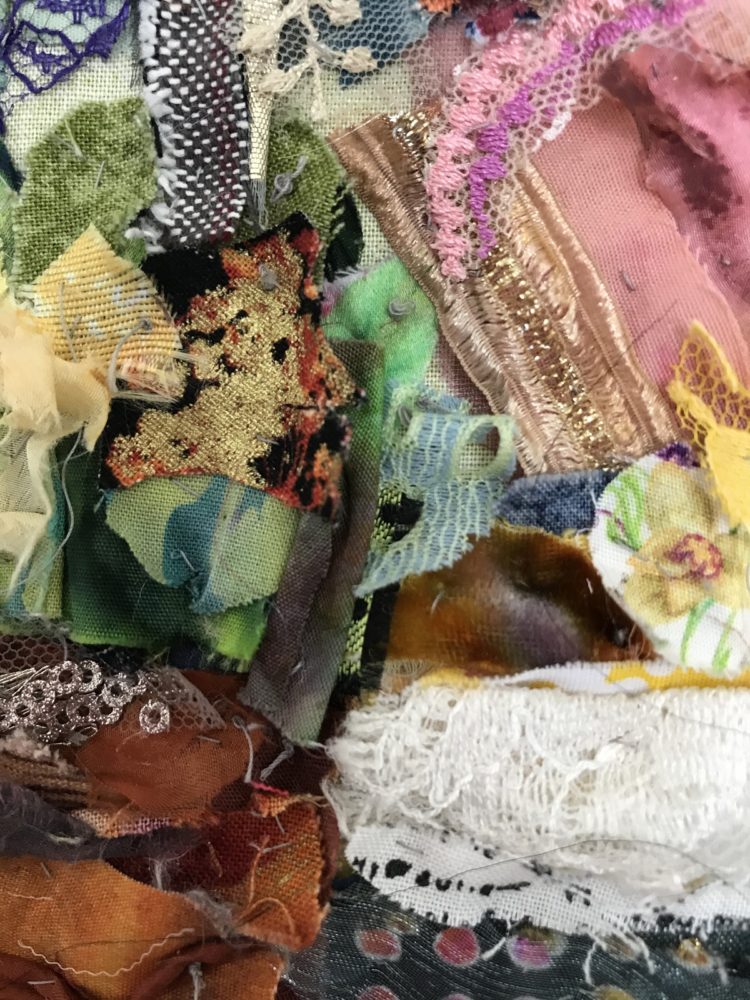 Barbara Shaw: View from the Kitchen Sink (2020), 31 x 32 cm. Created from many carefully selected scraps of fabrics hand stitched in layers. Part of Barbara's #stayhomestaysafe series of places people stuck indoors would be familiar with.