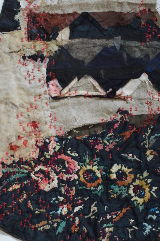 Mandy Pattullo: Back Stitch (2020), 30 x 19 cm. Stitch onto textile collage using the backs of vintage textiles.