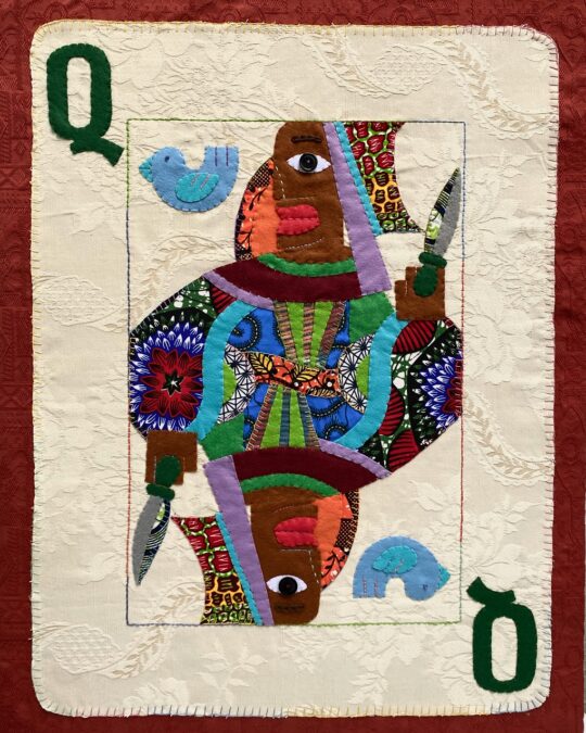 Marcia Bennett-Male, Queen of Self Sabotage, 2023. 70.5cm x 53.5cm (28” x 21”). Hand stitch. Felt, African fabric, upholstery fabric, buttons.