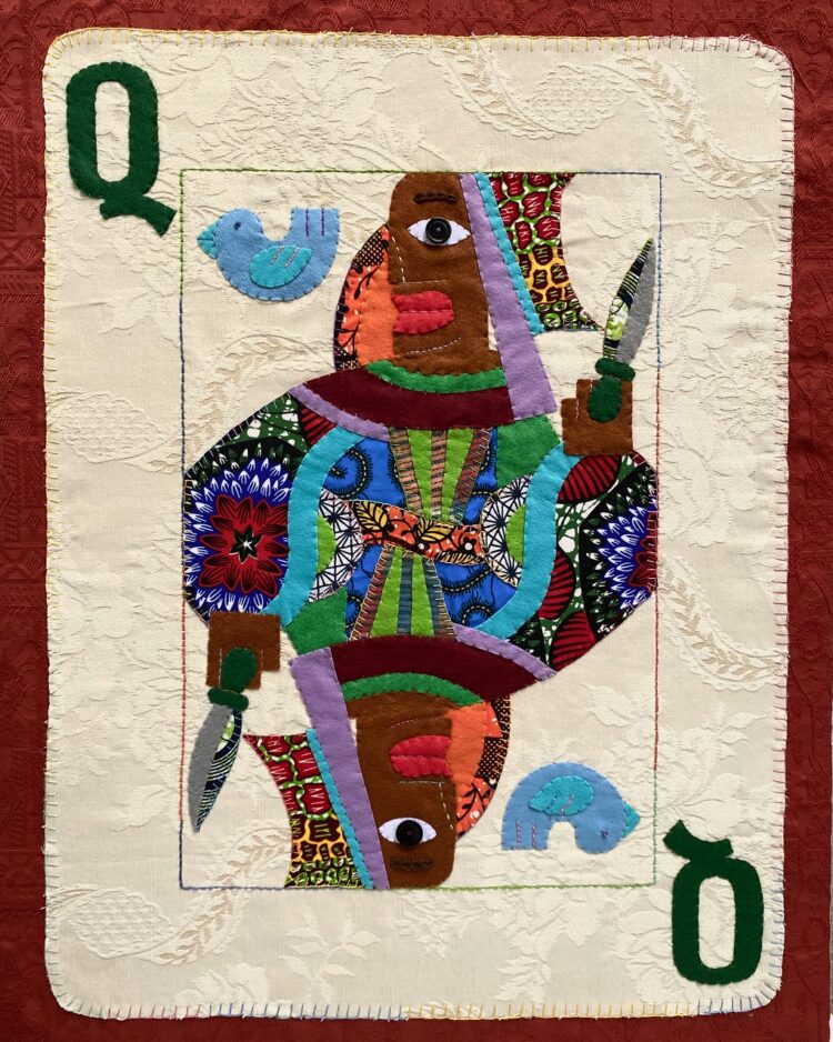 Marcia Bennett-Male, Queen of Self Sabotage, 2023. 70.5cm x 53.5cm (28” x 21”). Hand stitch. Felt, African fabric, upholstery fabric, buttons.