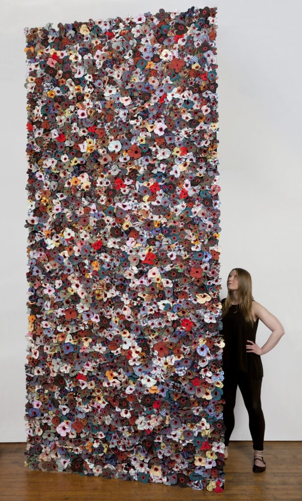 Jodi Colella: Once Was, 2019, 12 ft h x 5 ft w, Donated clothing, black velvet foundation, red embroidery cotton