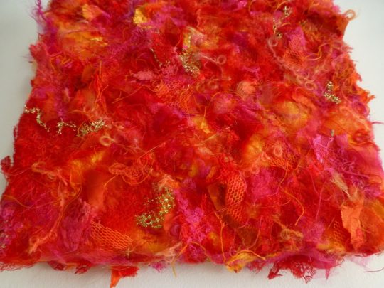 Emma Wigginton: On The Surface, 2017, 8" x 8", mixed fabrics, embellishing and free machine embroidery