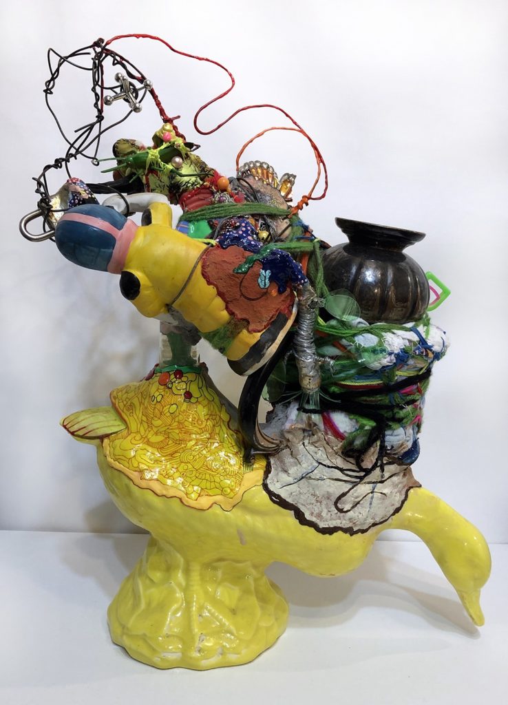 Julie Peppito: Survivor, 2019, 15” x 20” x 8”, Ceramic, found objects, thread, beads, paper mâché, fabric, yarn, wire.