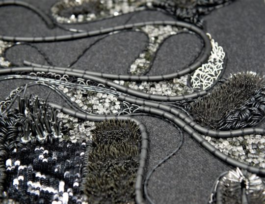 Elnaz Yazdani: Experimental Goldwork (detail), 2019, 100 x 80 cm, Contemporary Goldwork techniques, couching & beading. Rubber, glass, sequins, pipe, latex, crystal beads, nails, bolts on wool.