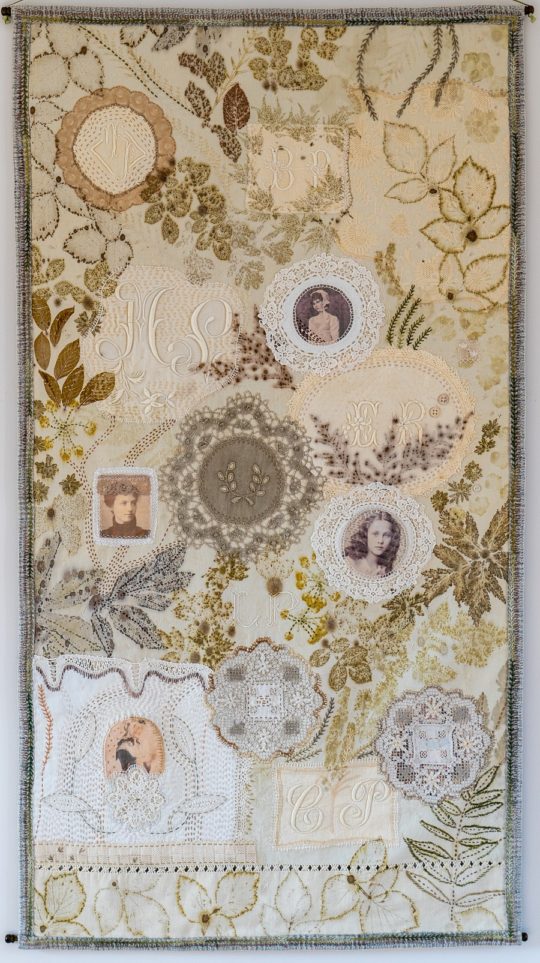 Caroline Nixon: Les brodeuses inconnues ( the unknown embroiderers ), 2020, 70 x120 cm, Vintage French linen sheets, monograms and doilies. Ecoprinted with plants from French hedgerows. Image transfer, hand stitch
