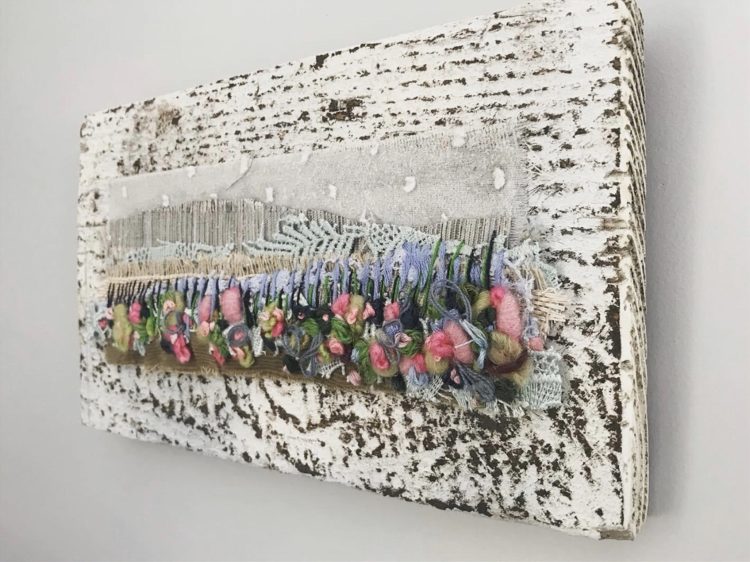 Emily Notman: Devon Landscape, 2019, 12cm x 20cm, Wool tops, felt, yarn, fabric mounted on rustic wood 