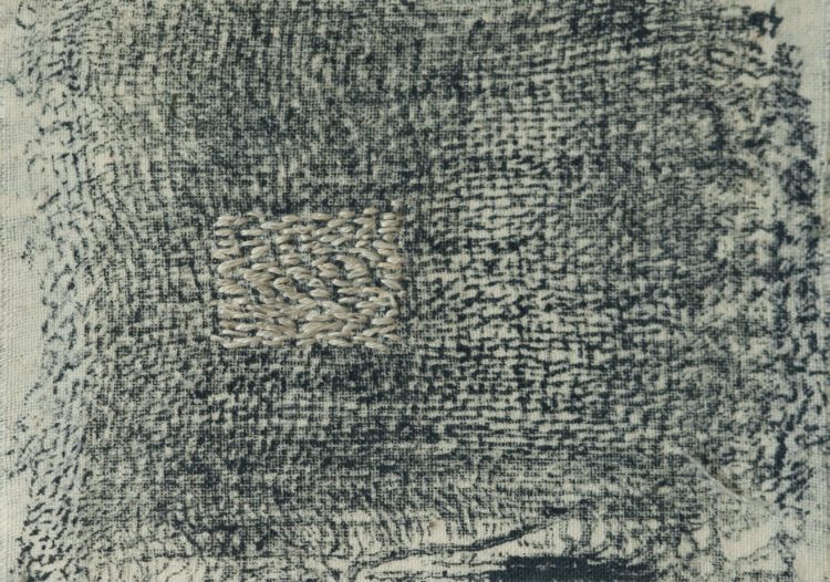 Gwen Hedley, Blueprint Patch, 2011. 7cm x 8cm (3" x 3"). Hand stitch, printing. Calico printed with inked old cloth. Photography: Melanie Chalk.