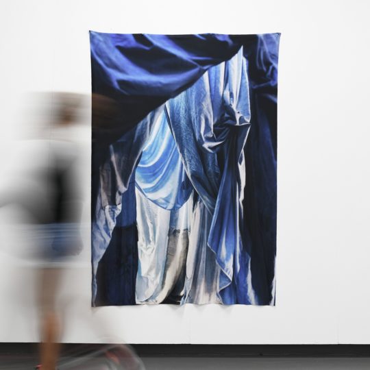 Rachael Wellisch: Enfolded Landscape #8, 2019, 180(h) x 120(w) cm, Photographic print of indigo-dyed, salvaged textiles onto textiles made from recycled plastic bottles