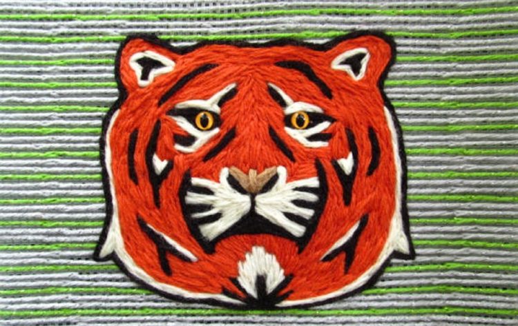 Stephen Cunningham: Tiger Face, 2020, 10.5" x 6.5", Yarn + Eyes