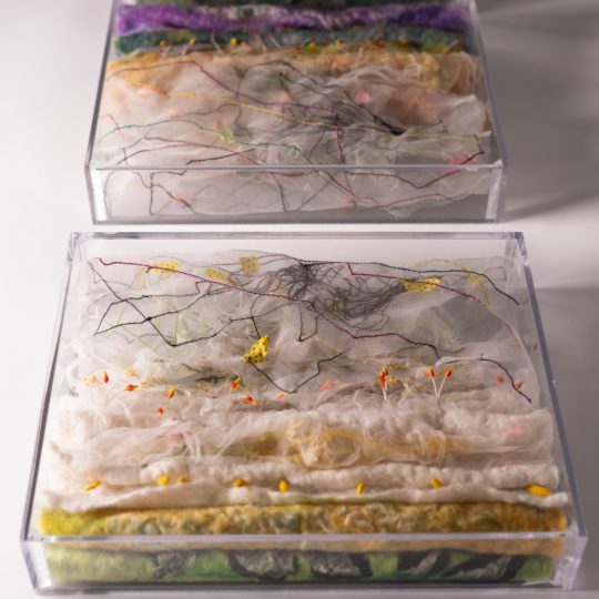 Jeanette Appleton: Pollution and Pollination (Detail), 2020, W:85 x H:4 x D:22.5 cm, Technique: Hand felting and machine stitch. Materials: Merino wool, silk fabric, threads, plastic flower parts. Photographer: @kind.design
