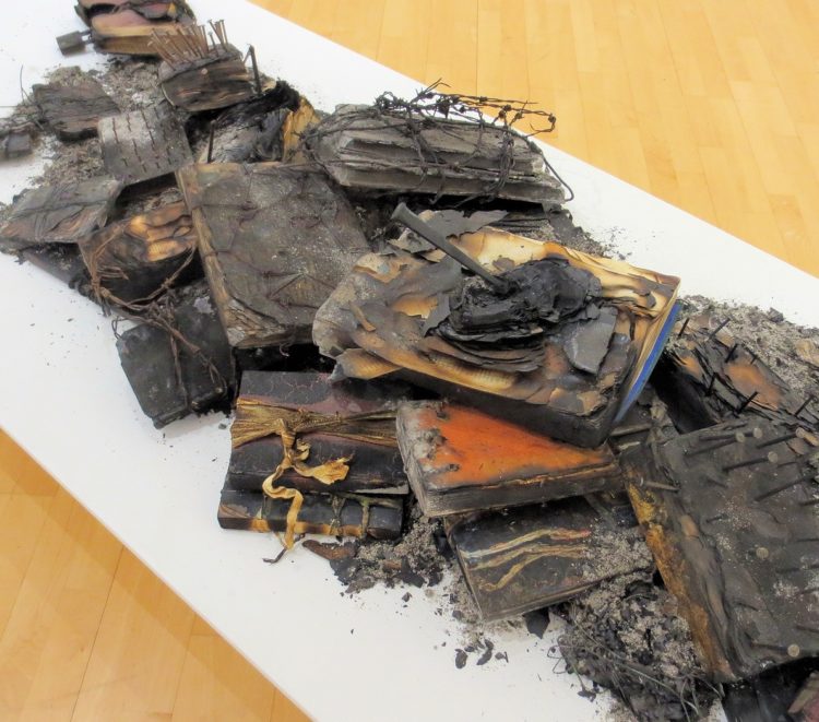 Jean Draper: Forbidden (Detail), 2019, 200cm x 100cm, Burnt books, nails, barbed wire, padlock, chains, wire, wrapped rags, ash, stitch