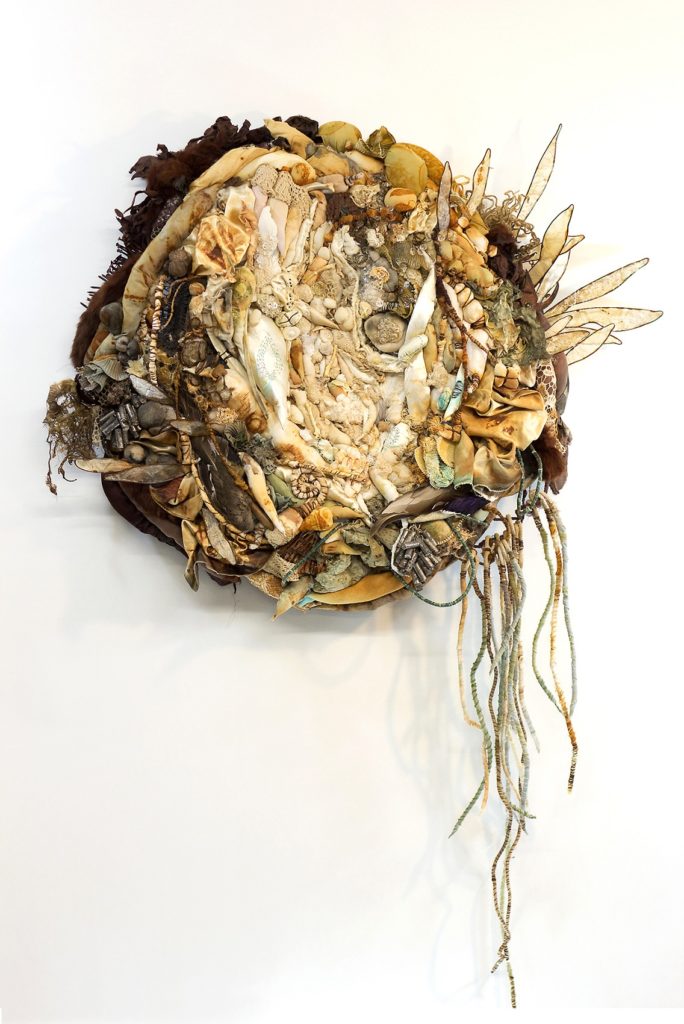 Clarissa Callesen, Fecundity, 2016. 53”x 33”x 7”. Recycled textiles, found objects, wire, animal membrane.