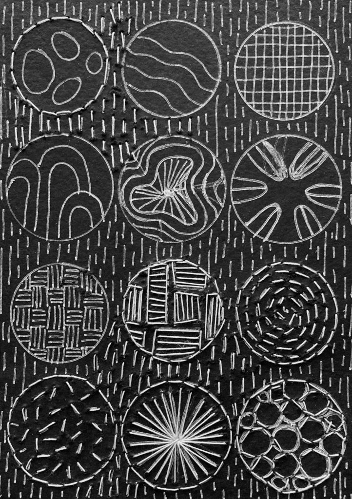 Jean Rill-Alberto, White on Black Sampler, 2021. 13cm x 18cm (5” x 7”). Hand stitch on paper. Black rag paper, white threads.