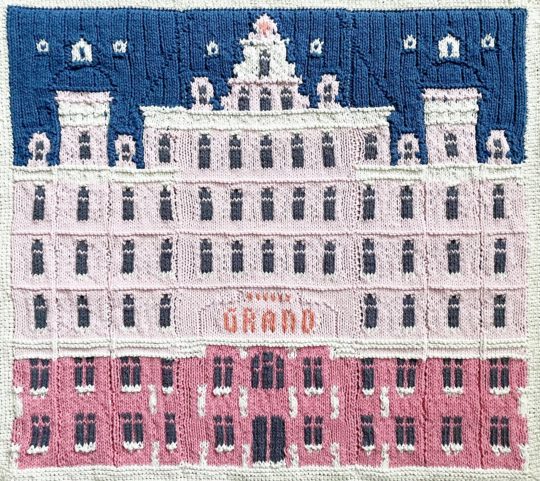 Jake Henzler, The Grand Hotel, 2021. 54cm x 50cm (21” x 20”). Knitted colourwork, patchwork, crochet. Cotton yarn, acrylic yarn.