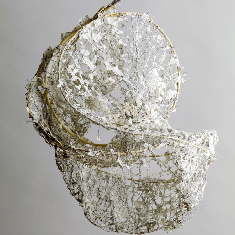 Siân Martin, Empty Nest, 2013. 40cm x 70cm (16" x 27½") Willow lengths, old school sketchbook pages. Steamed willow sculpture, disintegrated machine-stitched paper.