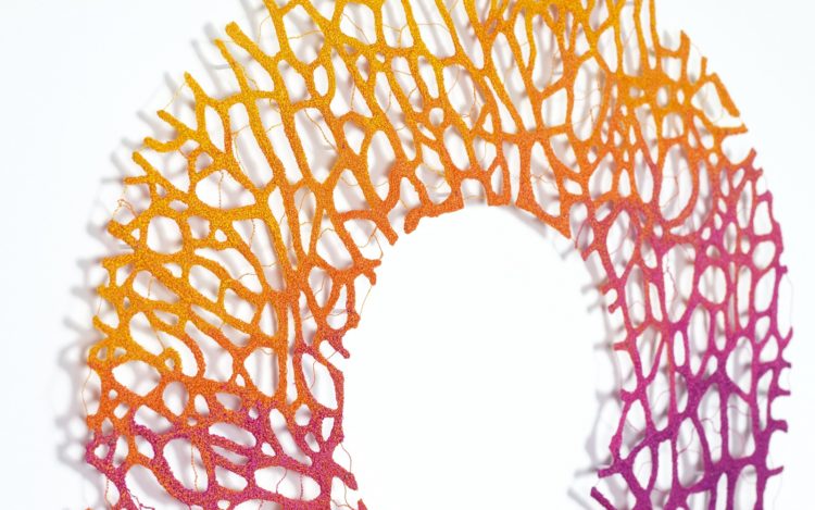 Meredith Woolnough, Coral Fan Atoll, (detail). 2021. 63cm x 63cm (25” x 25”). Freehand machine embroidery on water-soluble fabric. Embroidery thread and pins on paper.