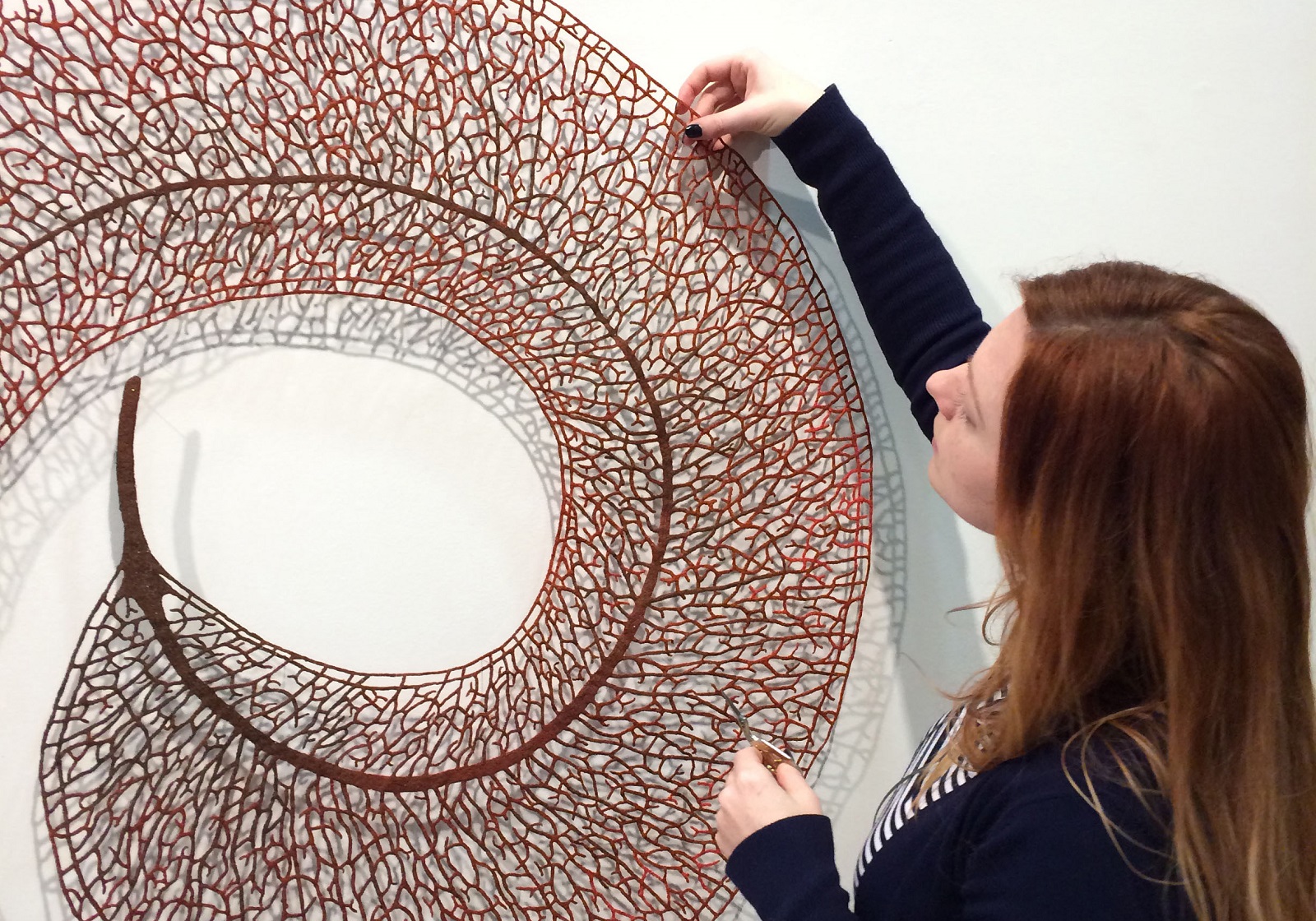 Meredith Woolnough, Scribbly Gum Leaf (installation). 2014. broidery on  water-soluble fabric. Embroidery thread and pins. 