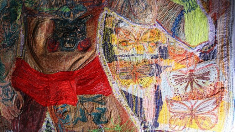 Oliver Bliss, Adaptive Evolution (detail), 2021. 110cm x 90cm (43" x 35").  Hand stitch, machine stitch, appliqué. Cotton, African wax print fabrics, sateen, recycled fabrics, mixed threads. Photo: Gerard Hughes.