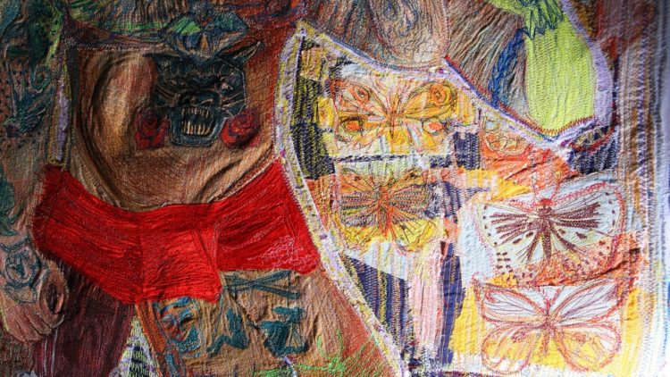 Oliver Bliss, Adaptive Evolution (detail), 2021. 110cm x 90cm (43" x 35"). Hand stitch, machine stitch, appliqué. Cotton, African wax print fabrics, sateen, recycled fabrics, mixed threads. Photo: Gerard Hughes.