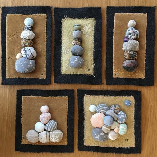 Heléne Forsberg, Stuffed Stones, 2020. 20cm x 20cm (8" x 8"). Hand stitch, filled fabric stitched together. Wool and velvet backgrounds, various fabrics, wadding, threads. Clarissa Callesen, Sculpting with Stitches.