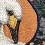 Yvette Phillips, Bewick’s Swan & Cygnet, 2021. 20cm x 30cm (8" x 12"). Hand embroidery. Silk and vintage Liberty fabric.