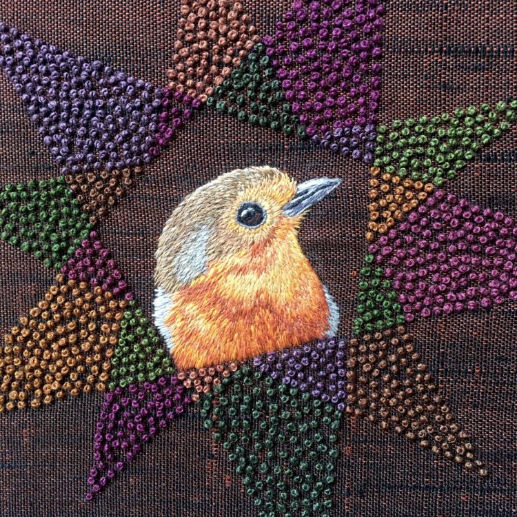 Yvette Phillips, Dutchy the Robin (detail), 2022. 20cm x 20cm (8" x 8"). Hand embroidery. Vintage silk.