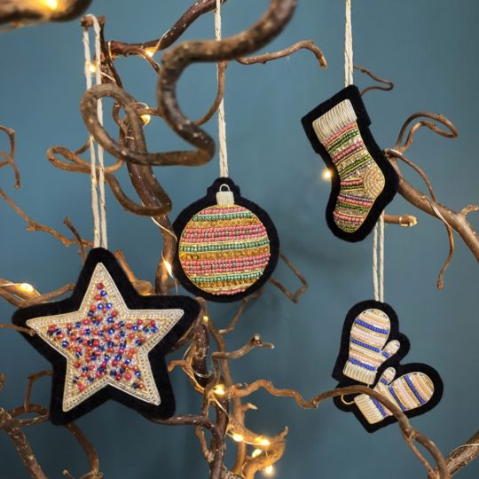 Hannah Mansfield, Christmas Decorations, 2022. 6cm x 6cm (2 ½” x 2 ½”). Goldwork and beading. Gold and silver goldwork wires, spangles, beads, wool felt, string.