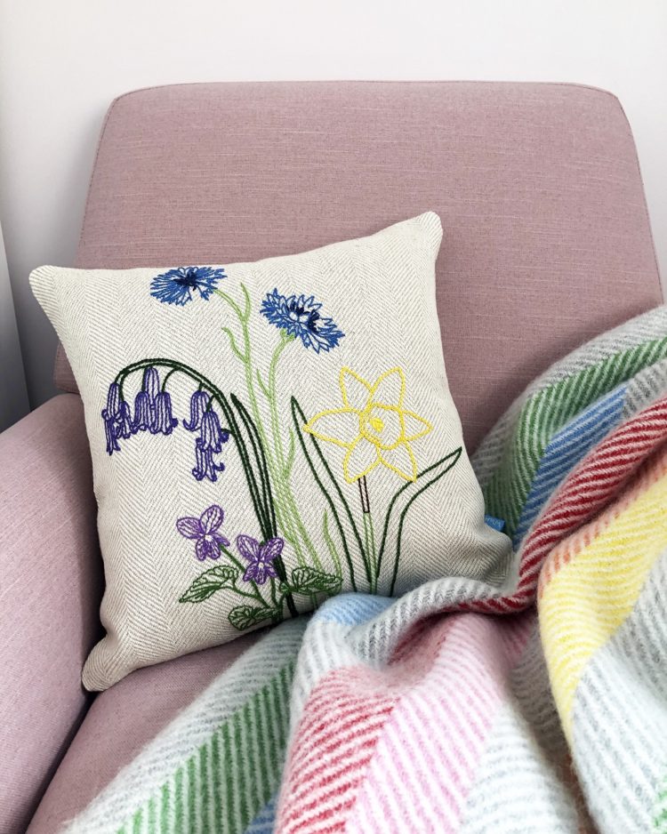 Hannah Mansfield, Wildflower cushion, 2021. 40cm x 40cm (15 ¾” x 15 ¾”). Chain stitch, stem stitch, satin stitch. Pearl cotton thread, linen fabric.