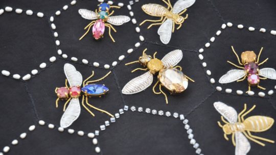Hannah Mansfield, Goldwork and Crystal Bees (detail), 2017. 30cm x 25cm (11 ¾” x 9”). Goldwork, tambour cutwork stitch and tambour beading. Gold and silver goldwork wires, crystals, cotton thread, pearl beads, glass beads and silk organza.