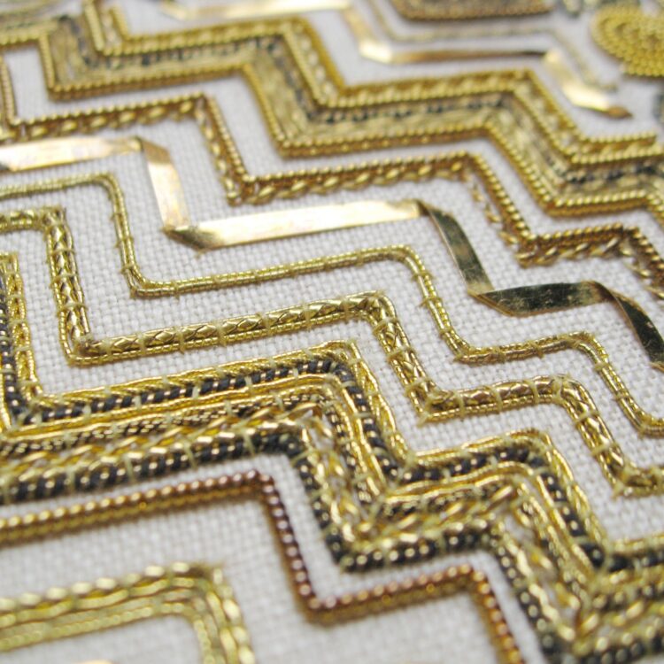 Tracy A Franklin, Linear Goldwork Sampler (detail), 2014. Approximately 15cm x 23cm (6’ x 9”). Goldwork couching. A variety of gold and metal threads worked on linen.