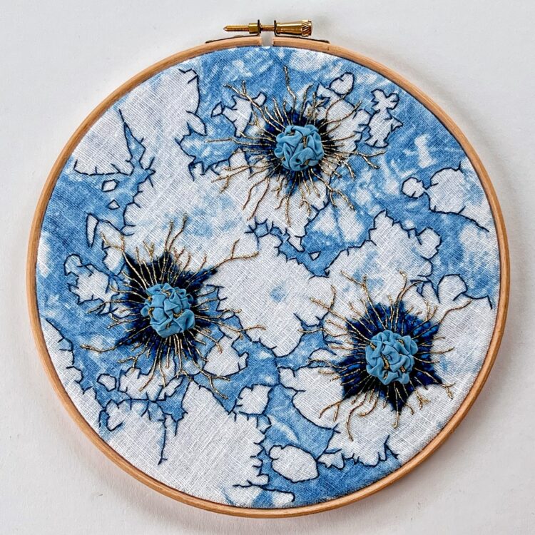 Mirjam Gielen, Immune system, 2021. 21cm diameter (8"). Indigo dyeing, fabric manipulation, embroidery. Indigo dyed linen, silk and velvet, embroidery threads, goldwork threads.