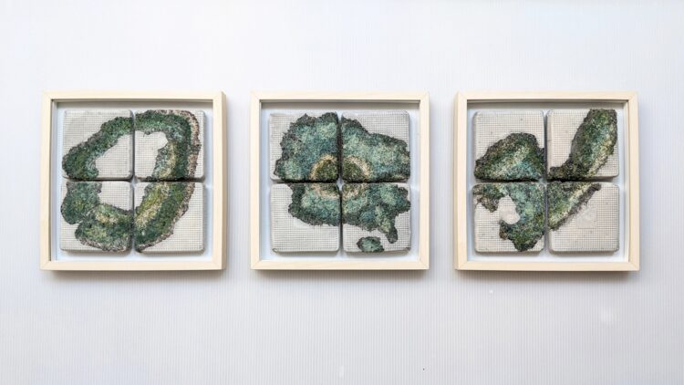 Nerissa Cargill Thompson, No Man is an Island (Sinking series), 2020. Triptych. Each 23cm x 2cm x 23cm (9" x ¾" x 9"). Embellished recycled fabrics cast with concrete in domestic plastic food packaging.