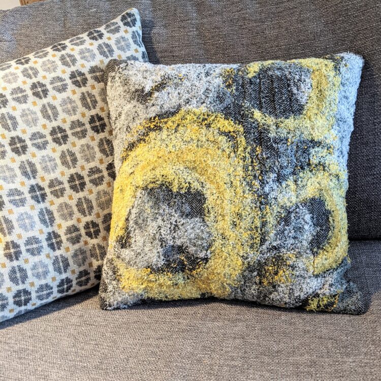 Nerissa Cargill Thompson, Lichen Cushion, 2020. 40cm x 15cm x 40cm  (15¾" x 6" x 15¾"). Embellished recycled fabrics.