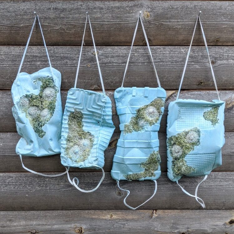 Nerissa Cargill Thompson, More Than Jellyfish, 2021. Approximately 40cm x 4cm x 10cm (15¾" x 1½" x 4"). Embellished and embroidered recycled fabrics cast with concrete in domestic plastic food packaging. Hung with elastic.