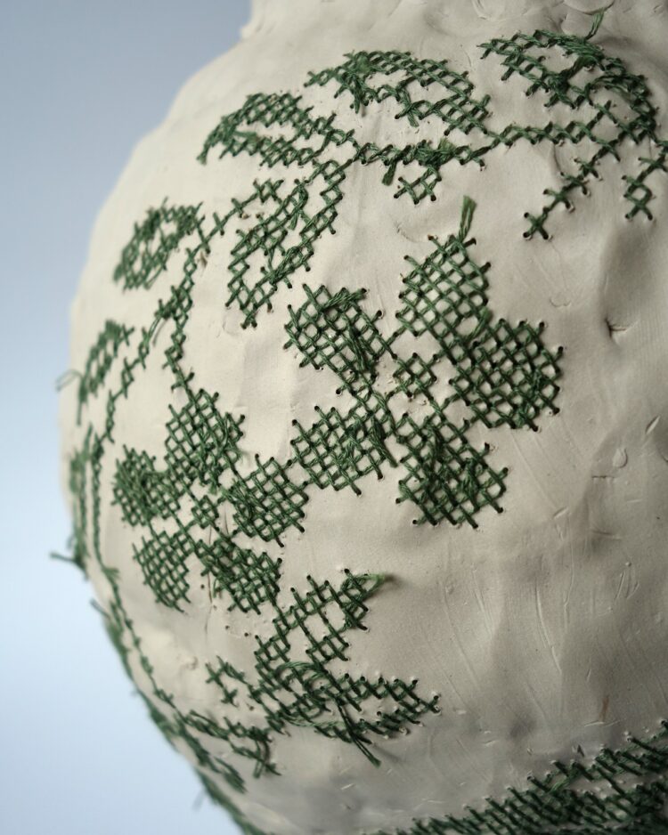 Caroline Harrius, Vase with Bird (detail), 2022. 45cm tall (17½“). Coiled stoneware, embroidered with cotton thread. Stoneware, cotton thread.