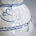 Caroline Harrius, Embroidered Vase, 2020. 40cm tall (15½“). Coiled porcelain, decorated with cotton thread. Porcelain, cotton thread.