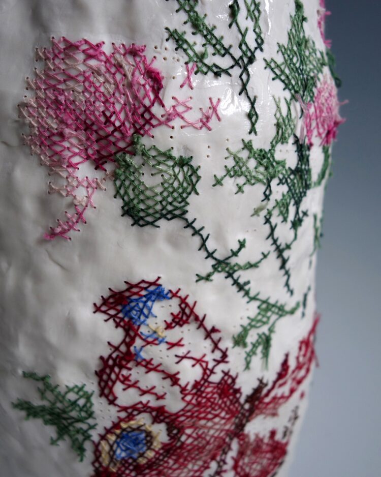 Caroline Harrius, Cross Stitched Vase with Butterfly (detail), 2021. 42cm tall (16½). Coiled porcelain, decorated with cotton thread, pattern from a DIY kit. Porcelain, cotton thread.