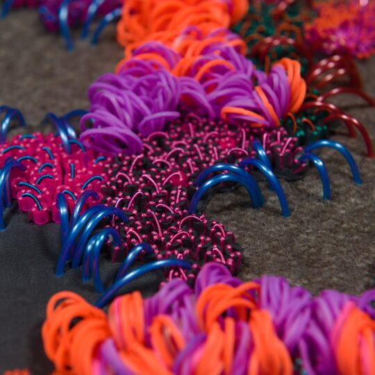 Elnaz Yazdani, Electric, 2019. 50cm x 60cm (20" x 24"). Beading, embellishment techniques, appliqué. Rubber, wool, silk, plastics, embroidery thread.