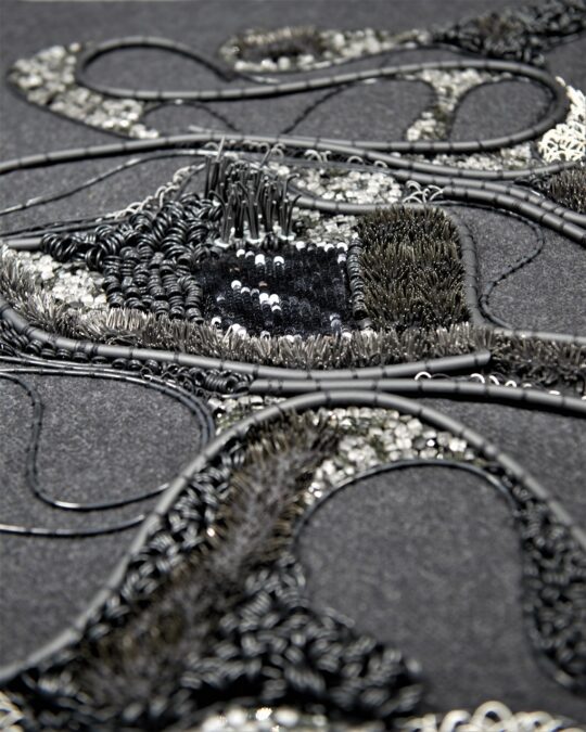 Elnaz Yazdani, Magnetic World, 2020. 60cm x 50cm (24" x 20"). Goldwork, couching, beadwork, embellishments. Rubber, wire, glass, purl wire, pins, metal, sequins, crystal beading.