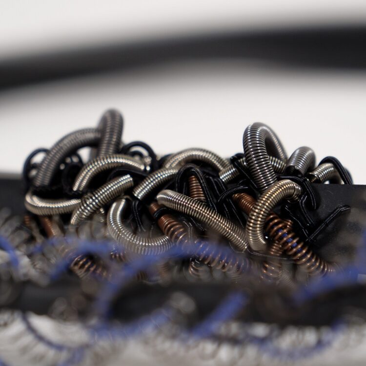Elnaz Yazdani, Zardozi-Style Necklace, (detail) 2019. 30 x 25cm (12" x 10"). Goldwork techniques. Bullion wire, springs, metal, rubber, linen thread.