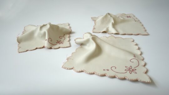 Caroline Harrius, Wipe Up, 2022. 25cm x 25cm (10“ x 10“). Pin rolled and embroidered porcelain. Porcelain, cotton thread.