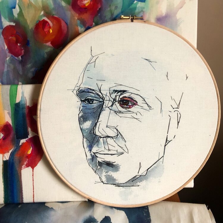 Elizabeth Griffiths, Portrait Artist of the Year portrait of Bruno Tonioli, 2022. 30cm x 30cm (12” x 12”). Mixed media. Fabric, watercolour, embroidery thread.