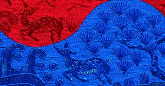 Heewha Jo, Taegeuk-gi, the Korean flag, with longevity symbols (detail), 2019. 26cm x 24cm (10¼" x 9½"). Hand embroidery. Silk thread, silk gauze.